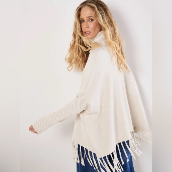 APRICOT Sweaters - Apricot 🍑 - Women’s Cream Turtleneck Fringe Poncho Sweater
